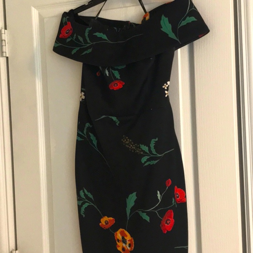 Beautiful off the shoulder floral black dress…….